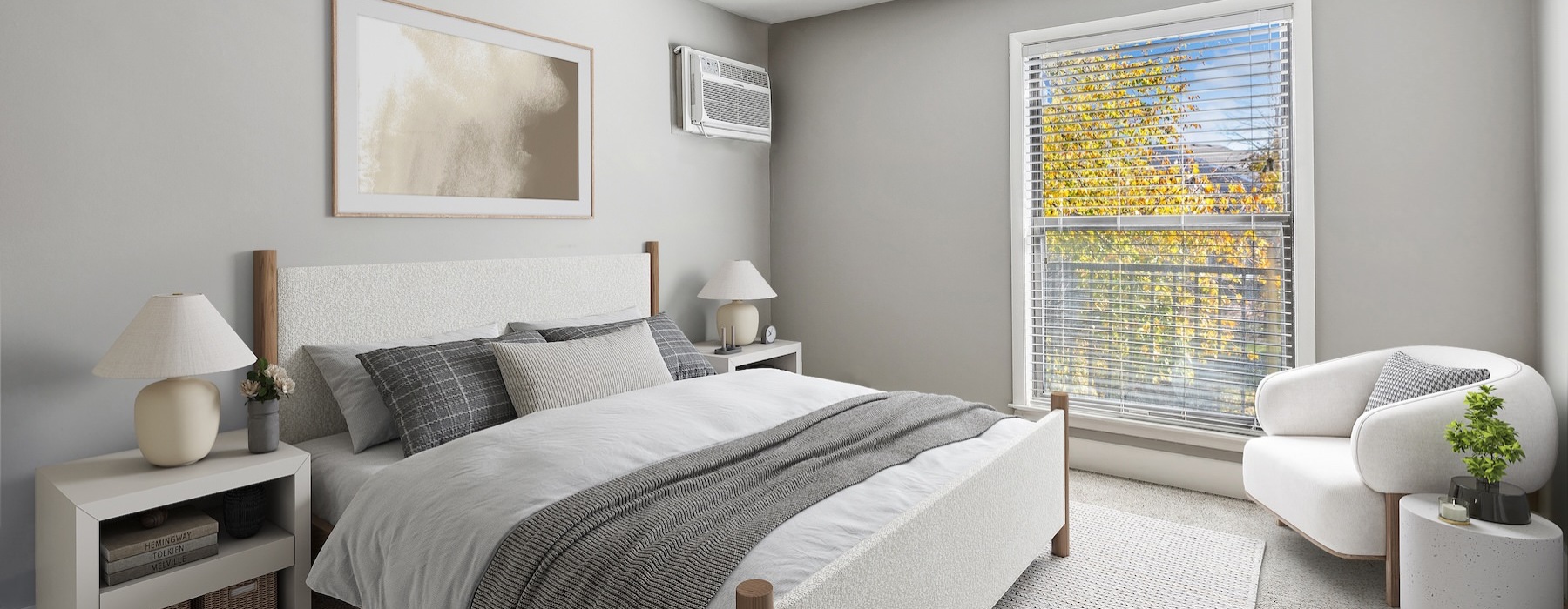 a bedroom with a bed and a window