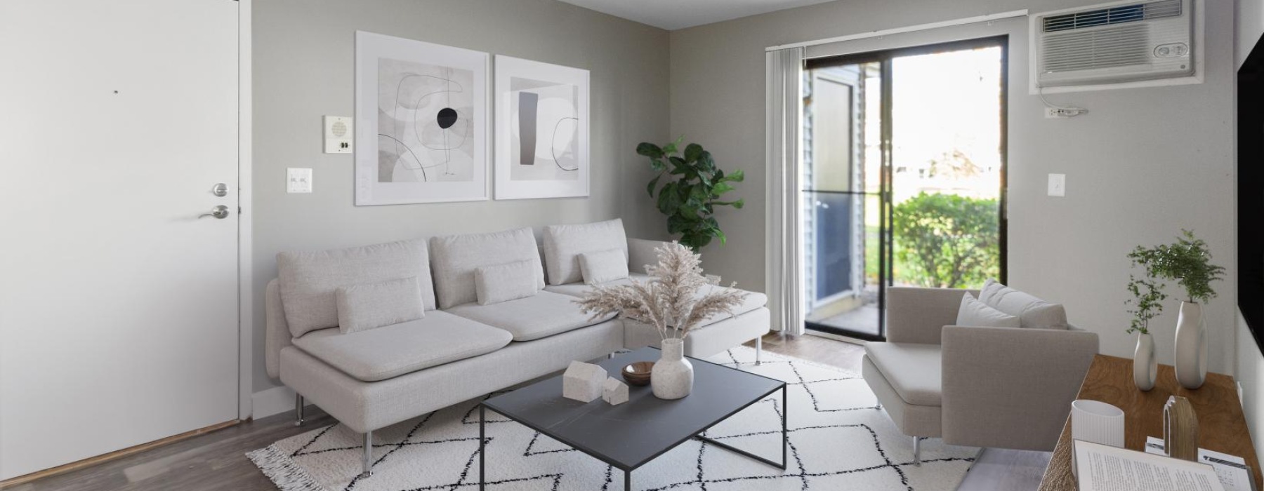 a living room with a couch and coffee table